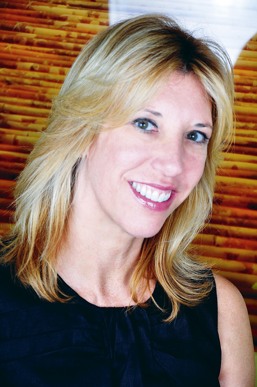 LAURA KOZELOUZEK, PRESIDENTE DE QUEST WORKSPACES